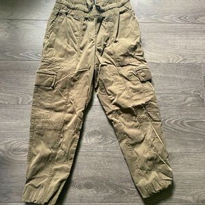 Roots Army Green Cargo pants. Tight ankle, fall season basic. Great for any day.
